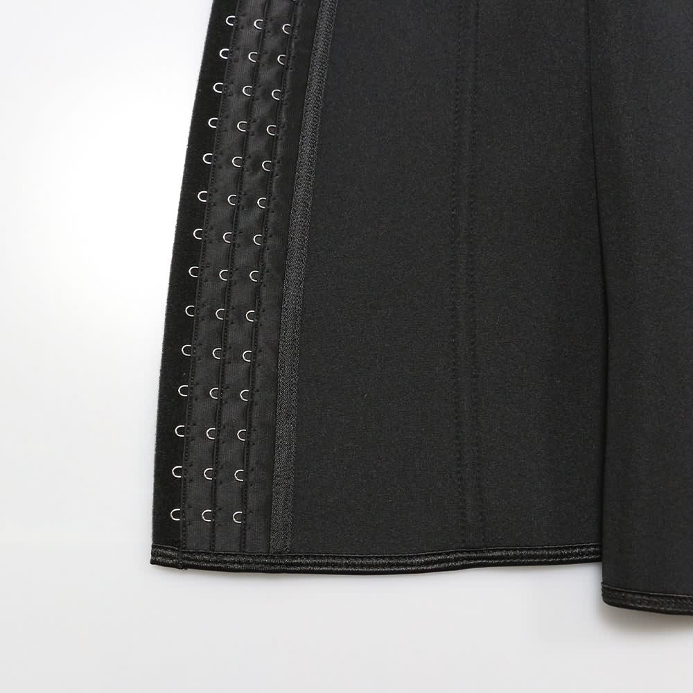 tache of black corset vest