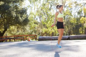 a girl is Skipping rope