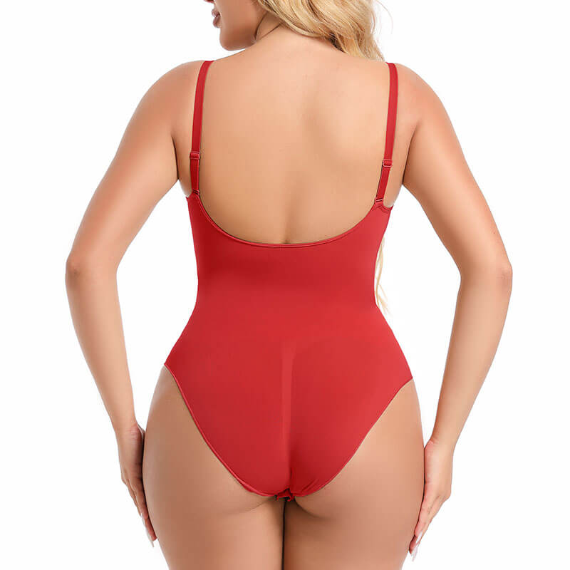 women wearing a seamless sculpt red brief bodysuit in back view