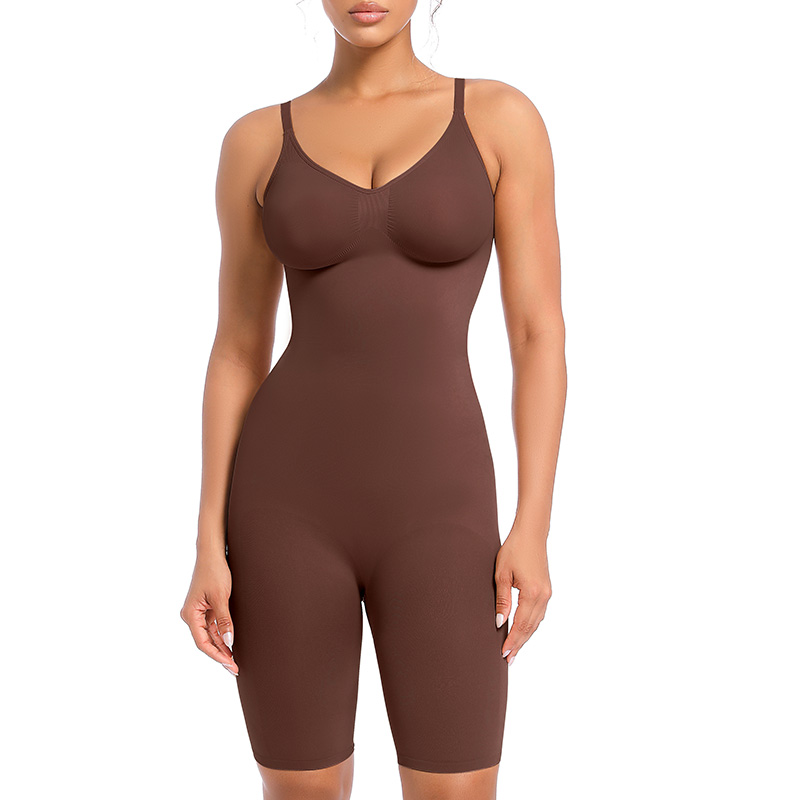 a model poses wearing the cocoa seamless mid thigh bodysuit