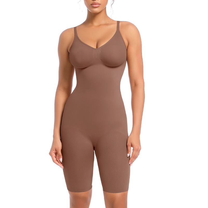 a model poses wearing the jasper seamless mid thigh bodysuit