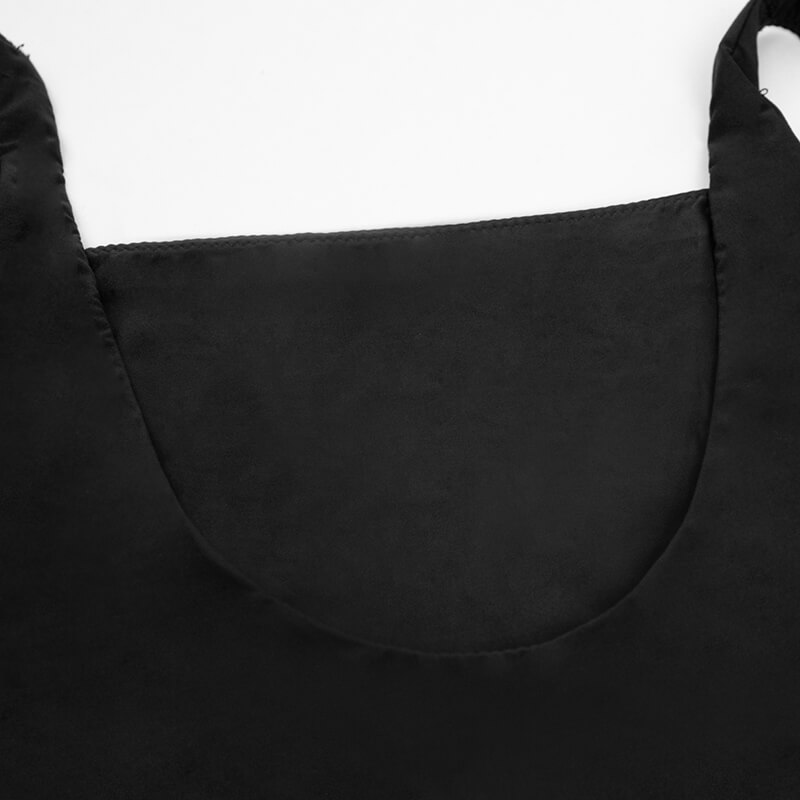 Detailed view of the U-shaped back neckline and inner stitching of a black women's black tank top.
